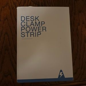 Desk clamp power strip